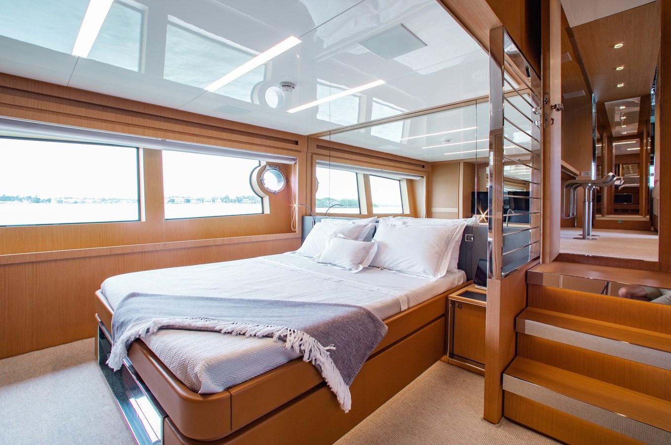 a room with a bed and a ladder aboard AMARA  Yacht for Sale