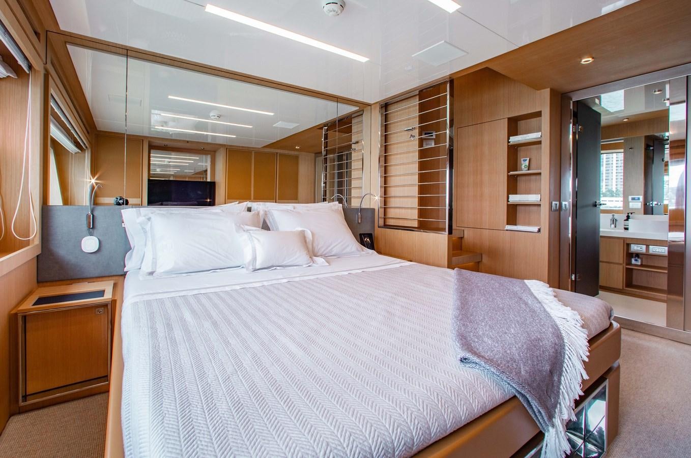 a large bed in a room aboard AMARA  Yacht for Sale
