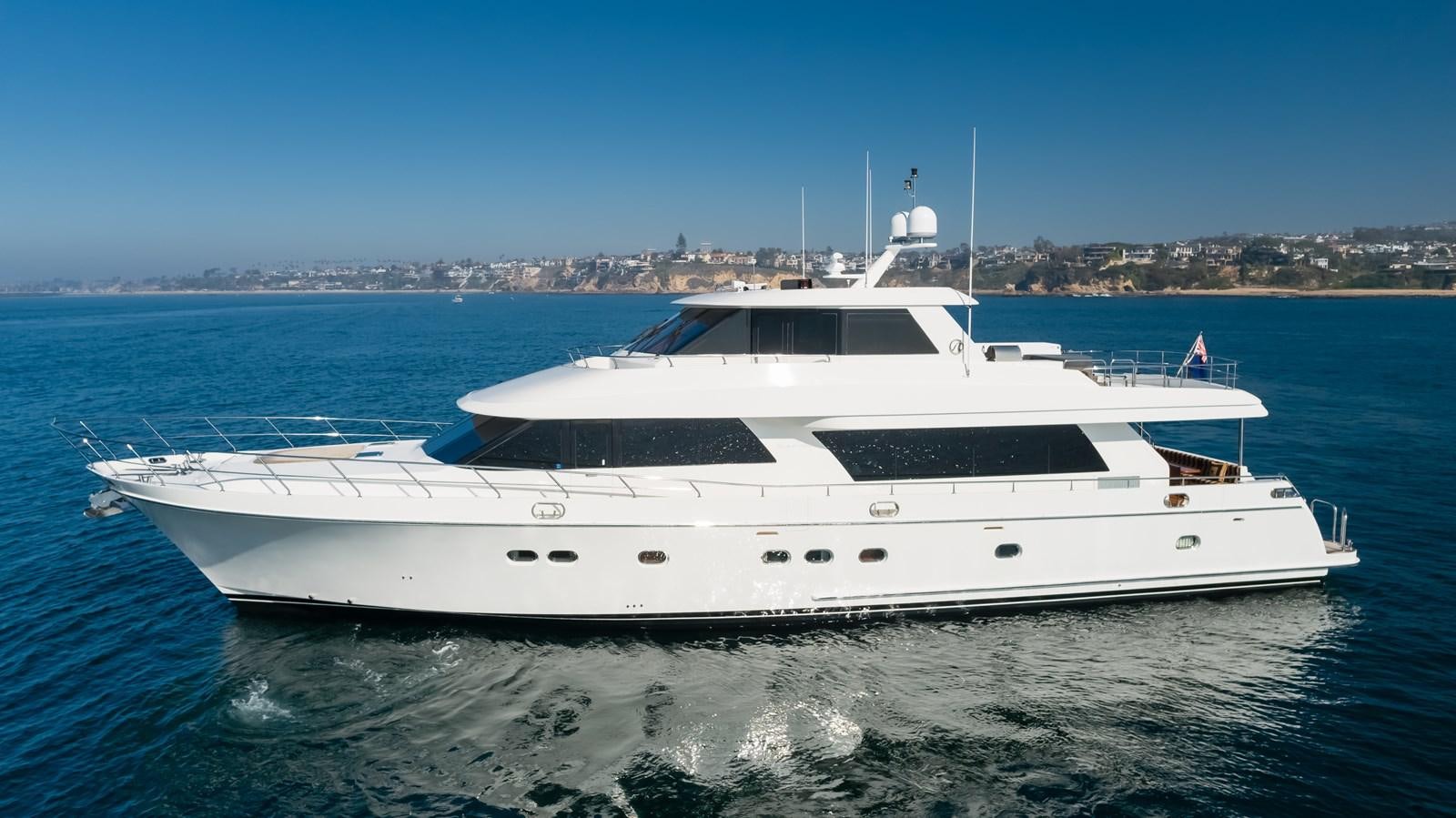 a white yacht on the water aboard HAWK EYE  Yacht for Sale