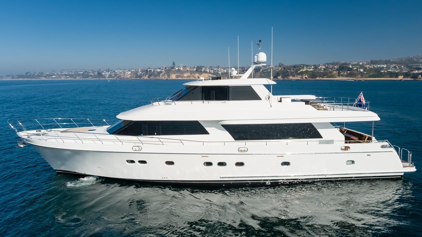a white yacht in the water aboard HAWK EYE  Yacht for Sale