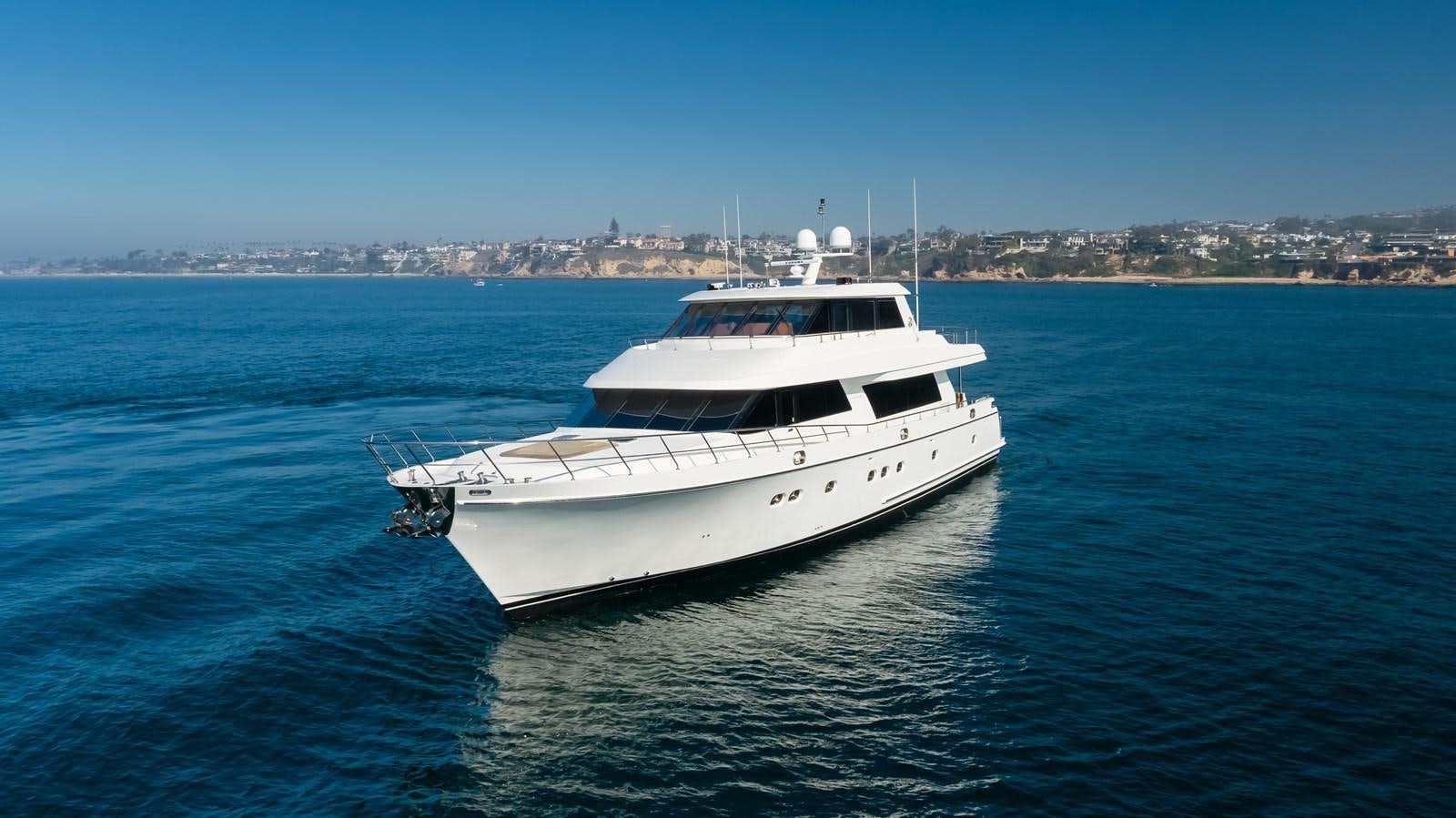 a white yacht in the water aboard HAWK EYE  Yacht for Sale