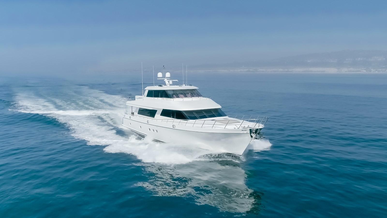 a white boat on the water aboard HAWK EYE  Yacht for Sale