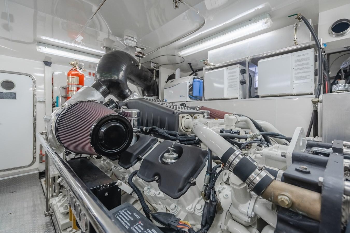 a machine with a large metal pipe aboard HAWK EYE  Yacht for Sale