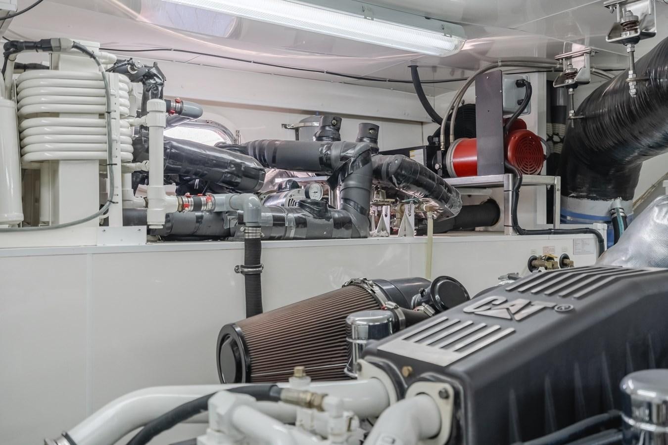 a machine with a large metal object aboard HAWK EYE  Yacht for Sale