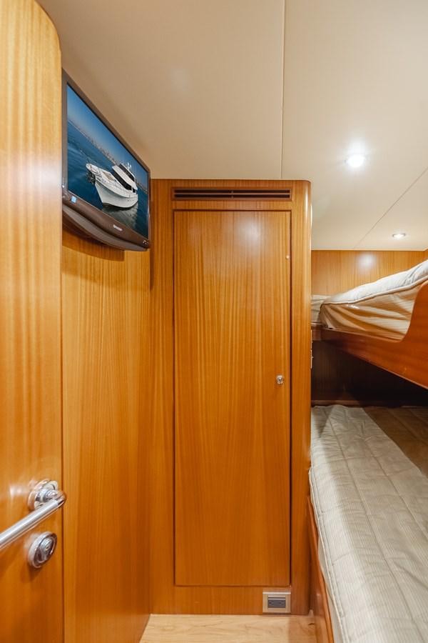 a tv on a wall aboard HAWK EYE  Yacht for Sale