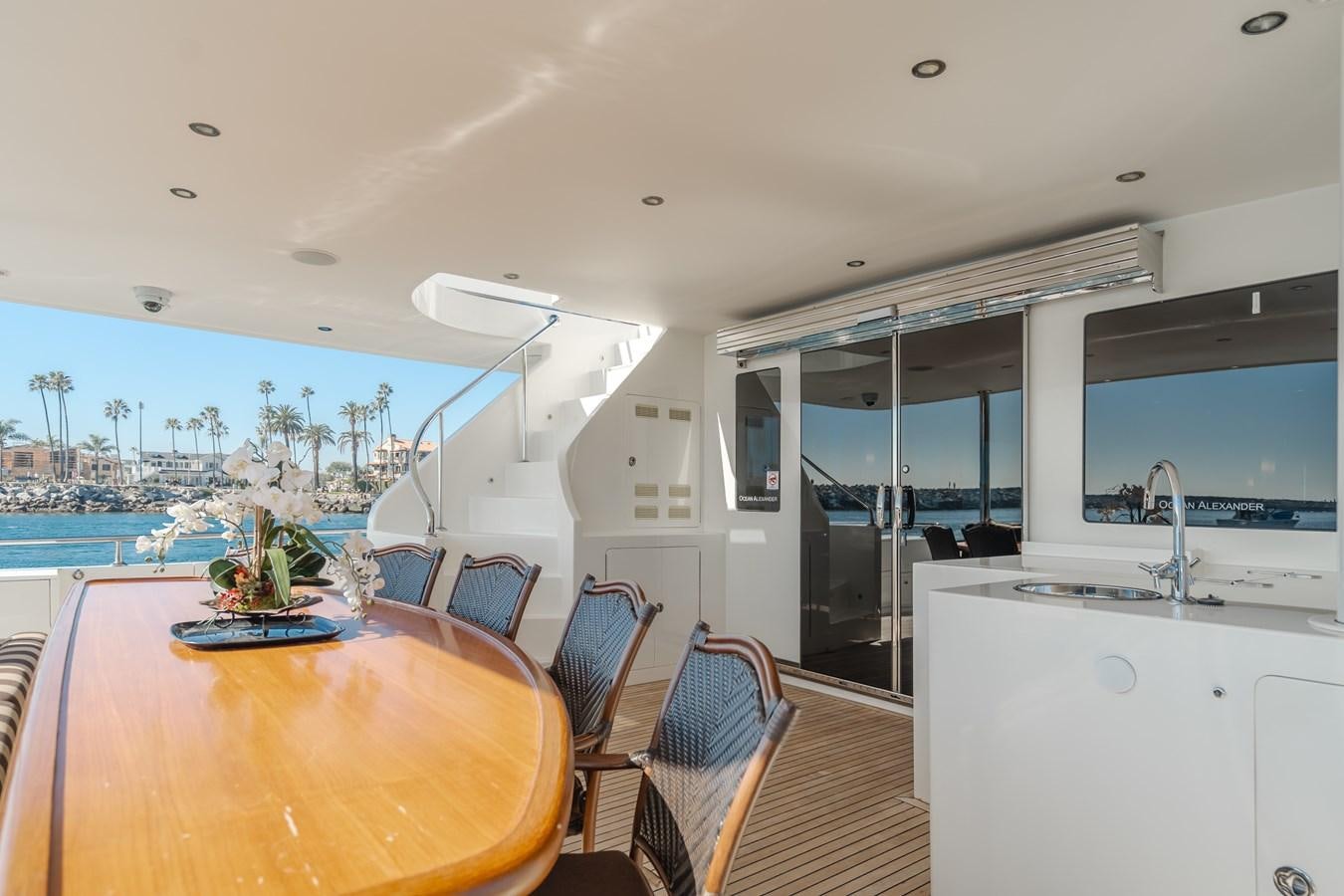 a dining table in a kitchen aboard HAWK EYE  Yacht for Sale