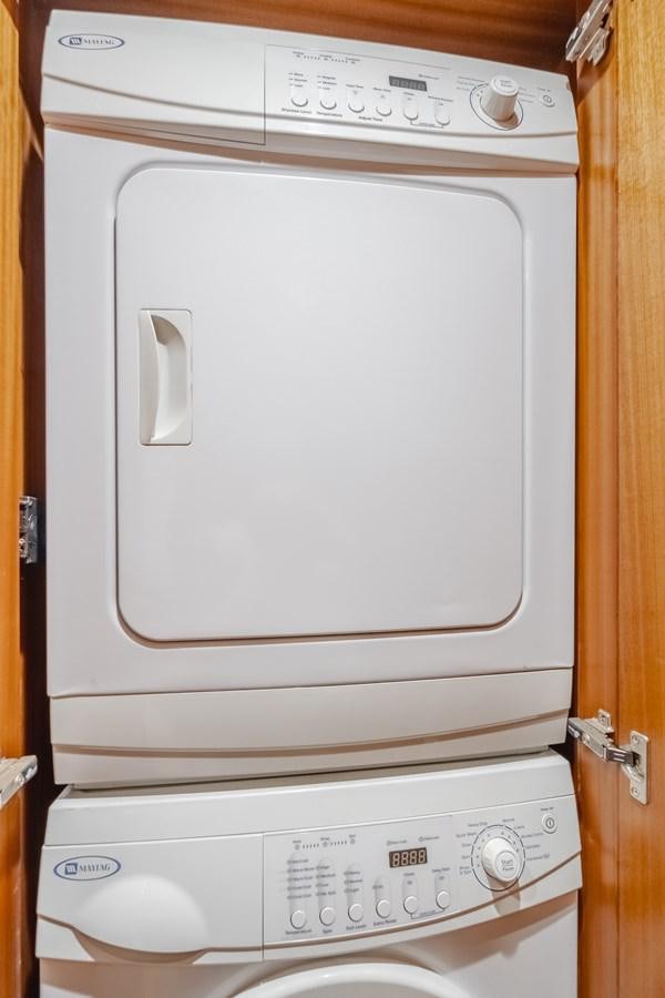a white washing machine aboard HAWK EYE  Yacht for Sale