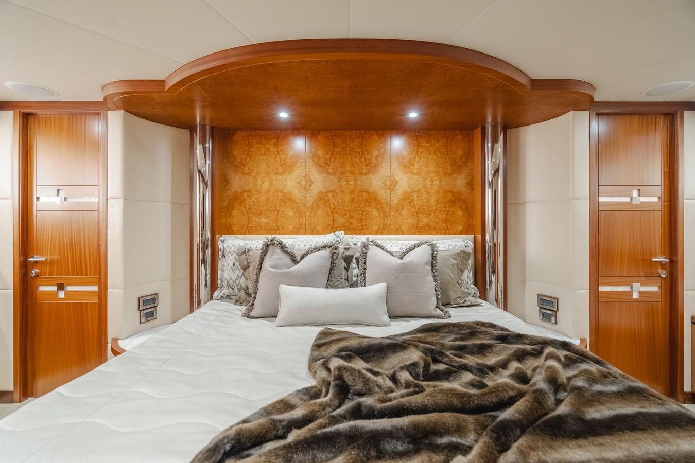 a bed with a large bed aboard HAWK EYE  Yacht for Sale