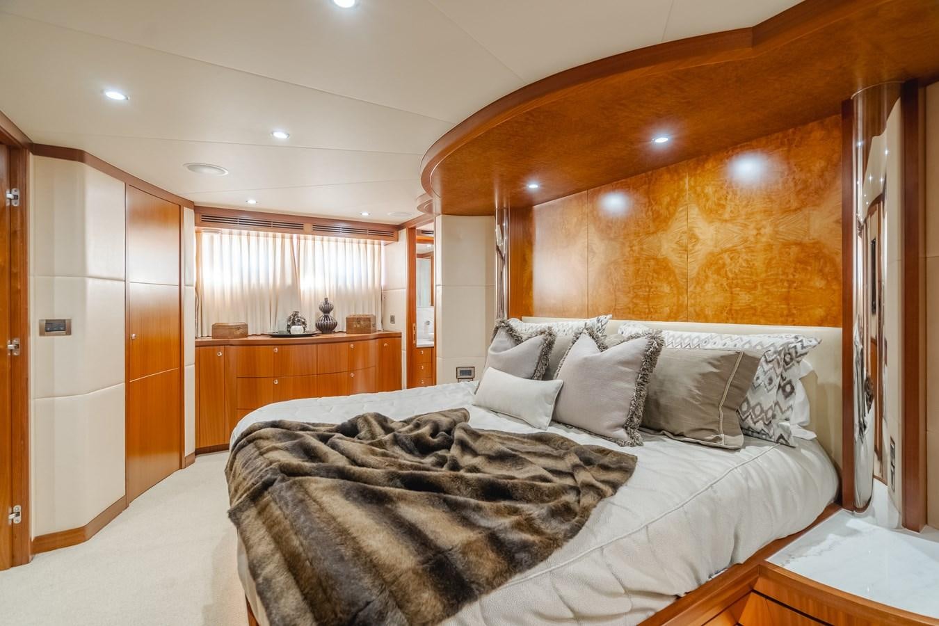 a bedroom with two beds aboard HAWK EYE  Yacht for Sale
