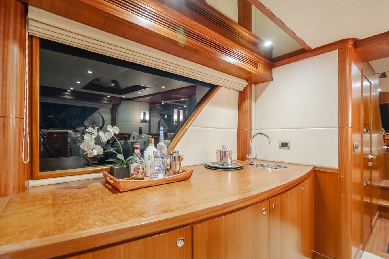 a kitchen with a large mirror aboard HAWK EYE  Yacht for Sale