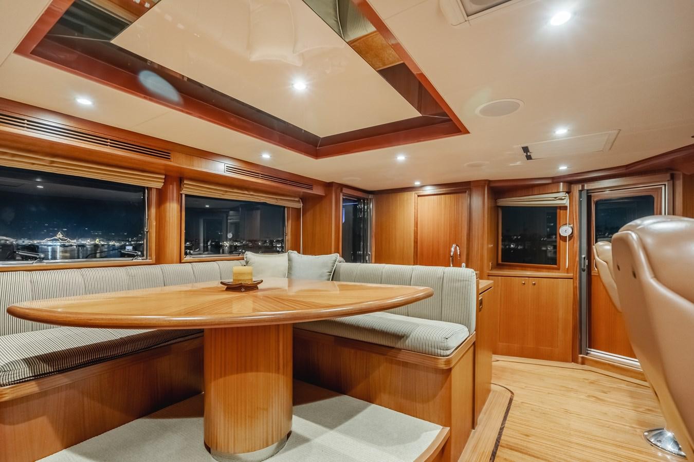 a large kitchen with a dining table aboard HAWK EYE  Yacht for Sale