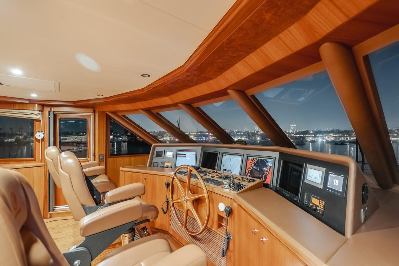a room with a desk and chairs aboard HAWK EYE  Yacht for Sale