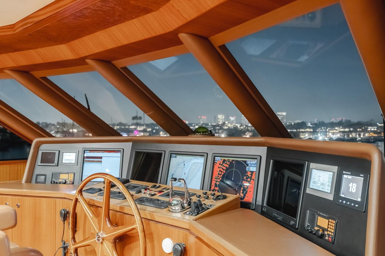 a table with a laptop on it aboard HAWK EYE  Yacht for Sale