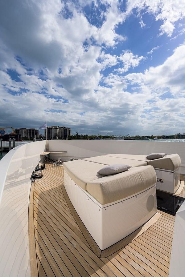 a large white boat on a deck aboard CHREEDO Yacht for Sale