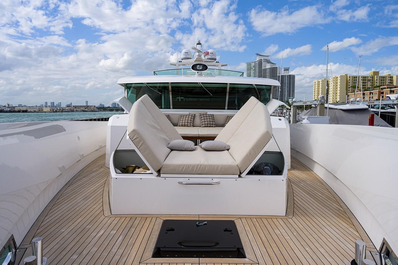 a white lounge chair on a boat aboard CHREEDO Yacht for Sale