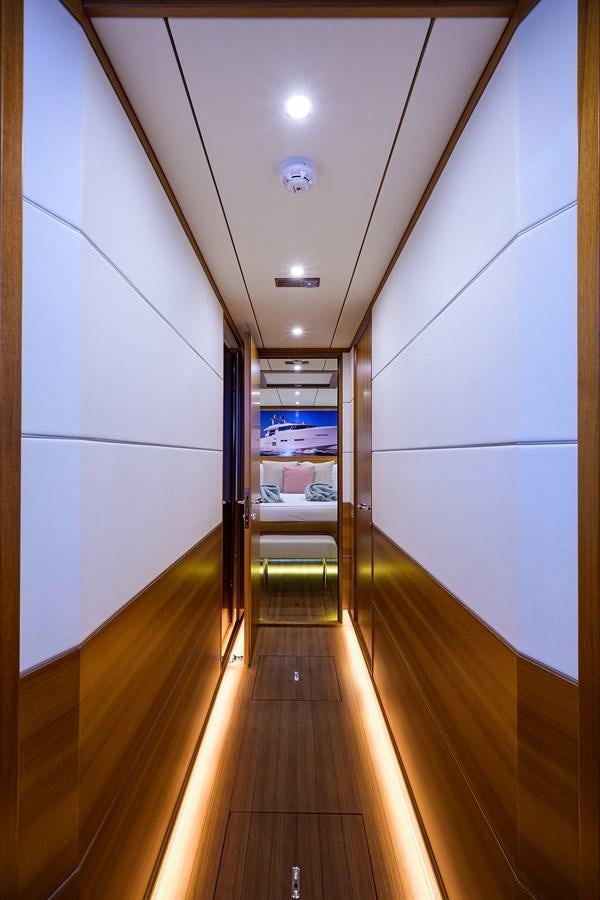 a long hallway with a wood floor and a wood floor aboard CHREEDO Yacht for Sale
