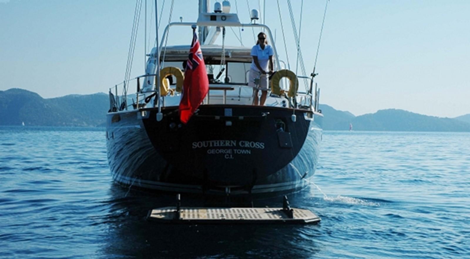 a man standing on a boat aboard SOUTHERN CROSS Yacht for Sale