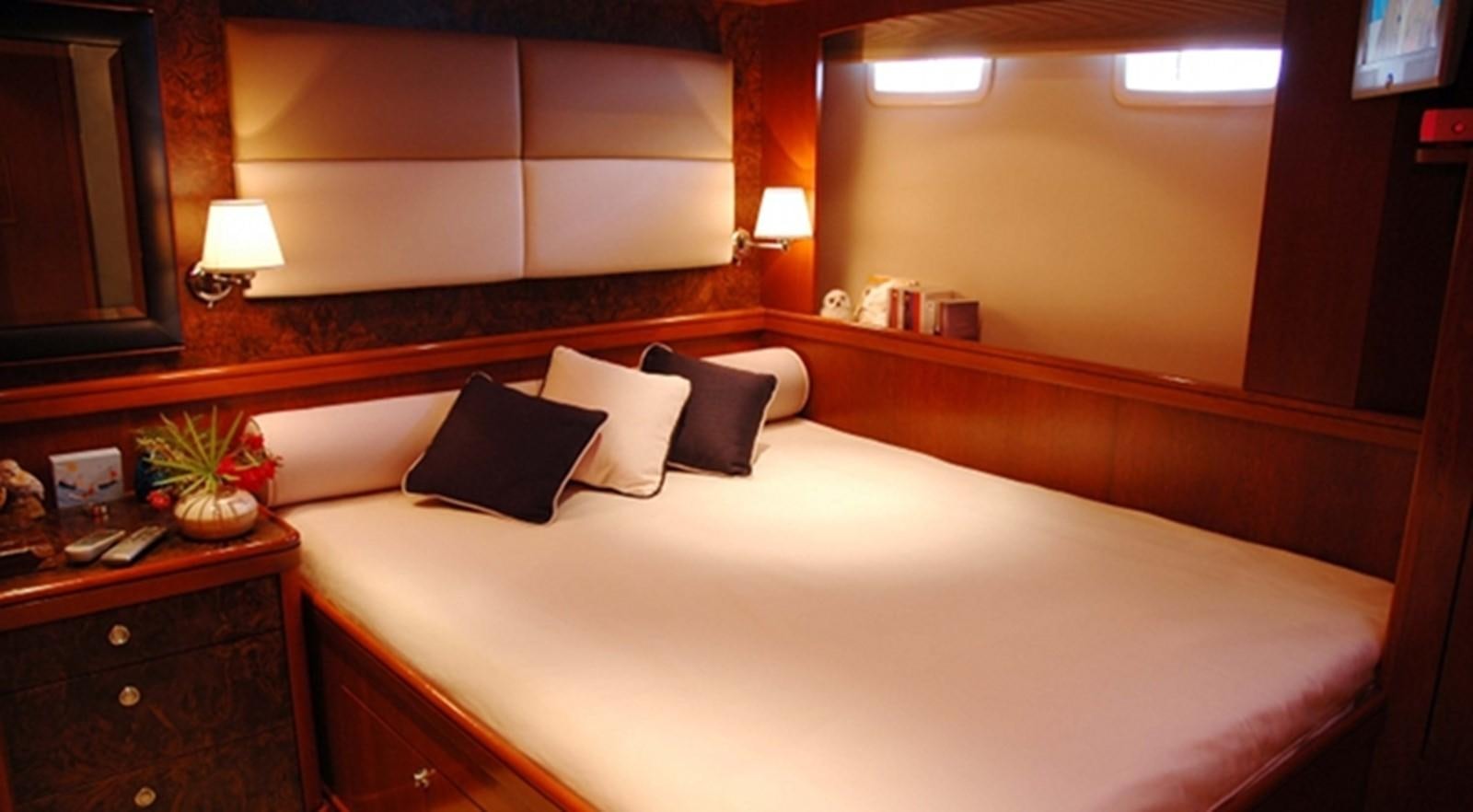 a bed with pillows and pillows aboard SOUTHERN CROSS Yacht for Sale