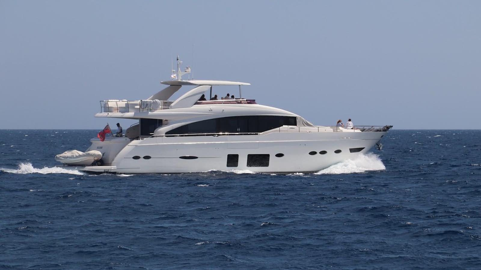 a white yacht in the water aboard ALLURE Yacht for Sale