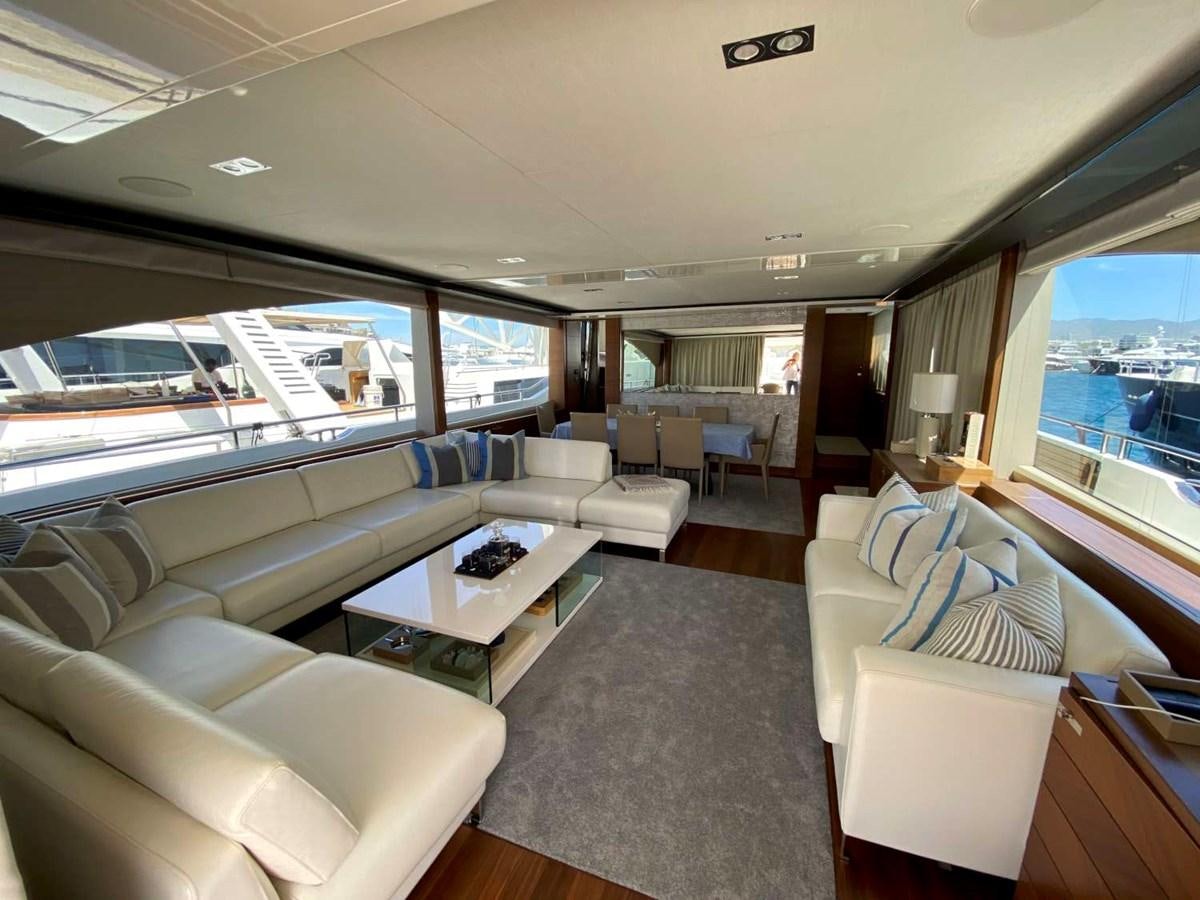 a large living room with a large window aboard ALLURE Yacht for Sale