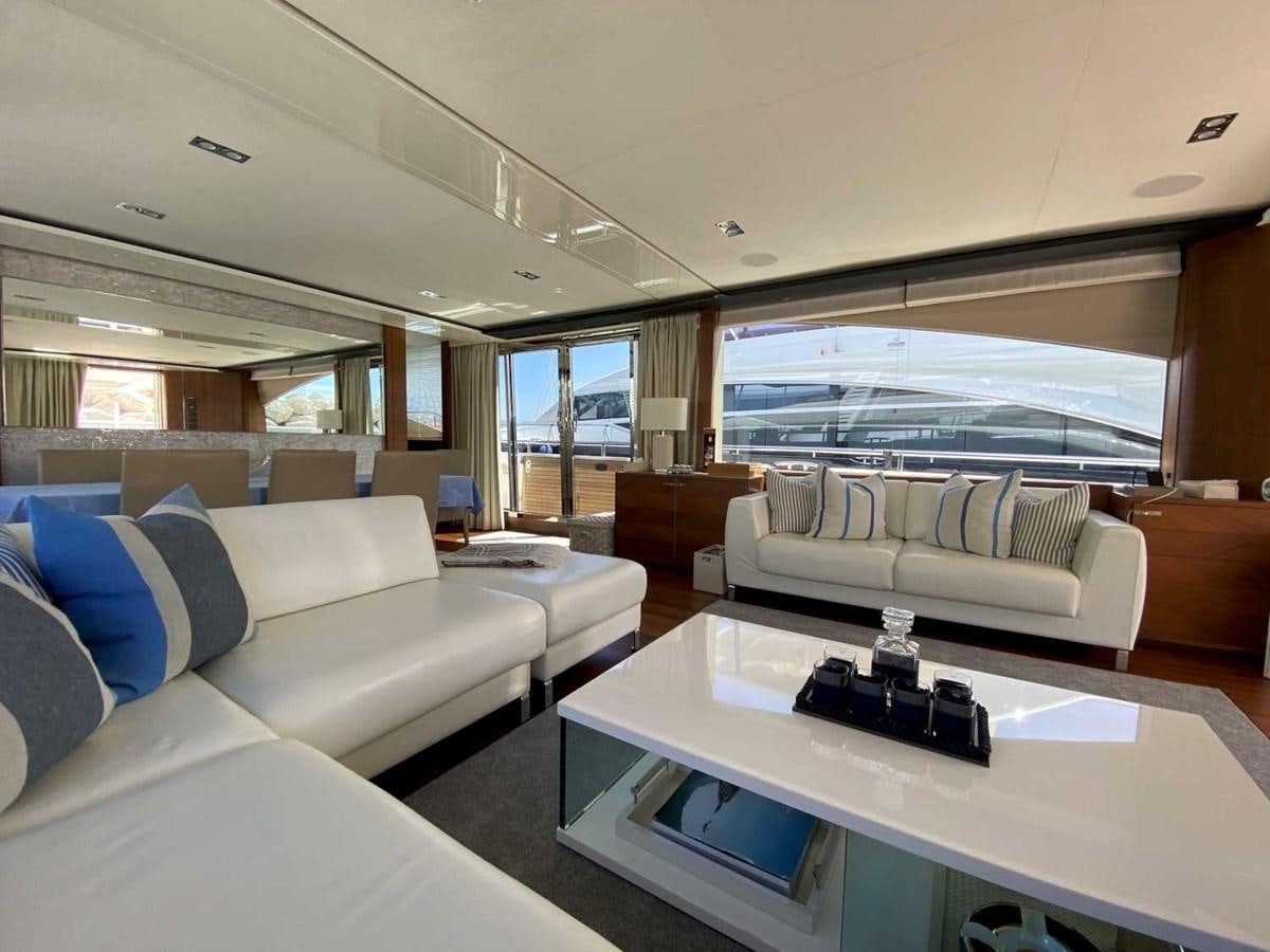 a living room with a large window aboard ALLURE Yacht for Sale