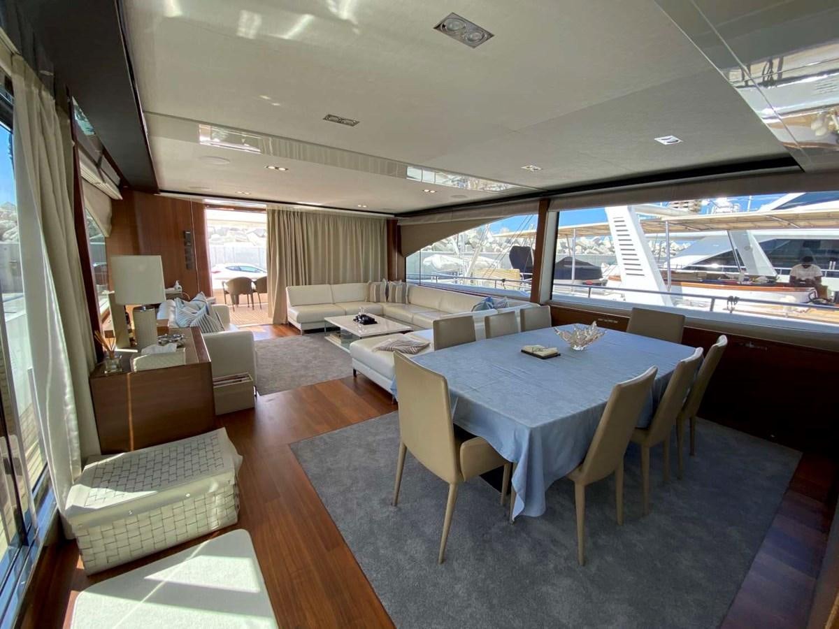 a large room with a table and chairs aboard ALLURE Yacht for Sale