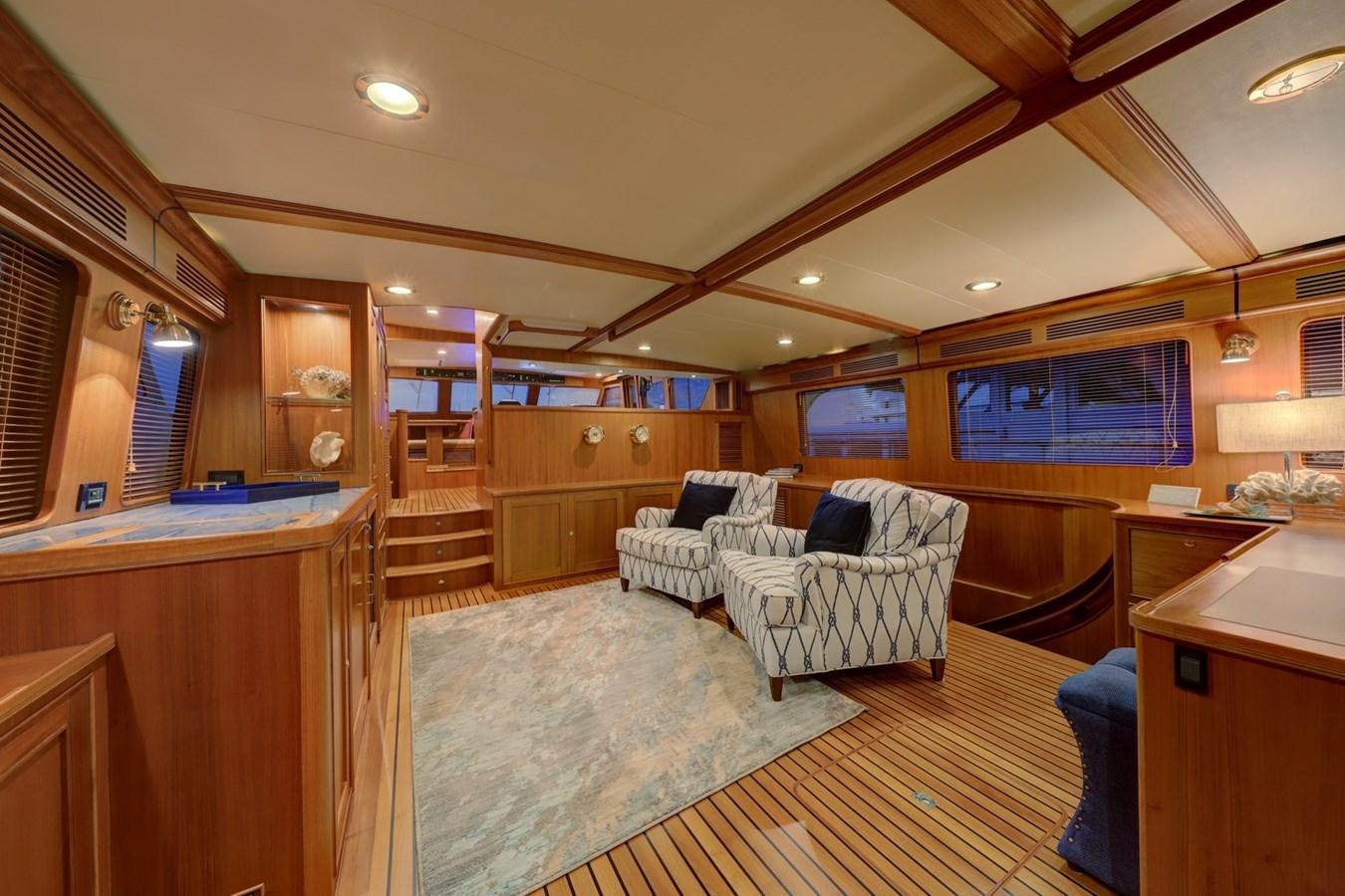 a room with a couch and a table aboard ONE LIFE Yacht for Sale