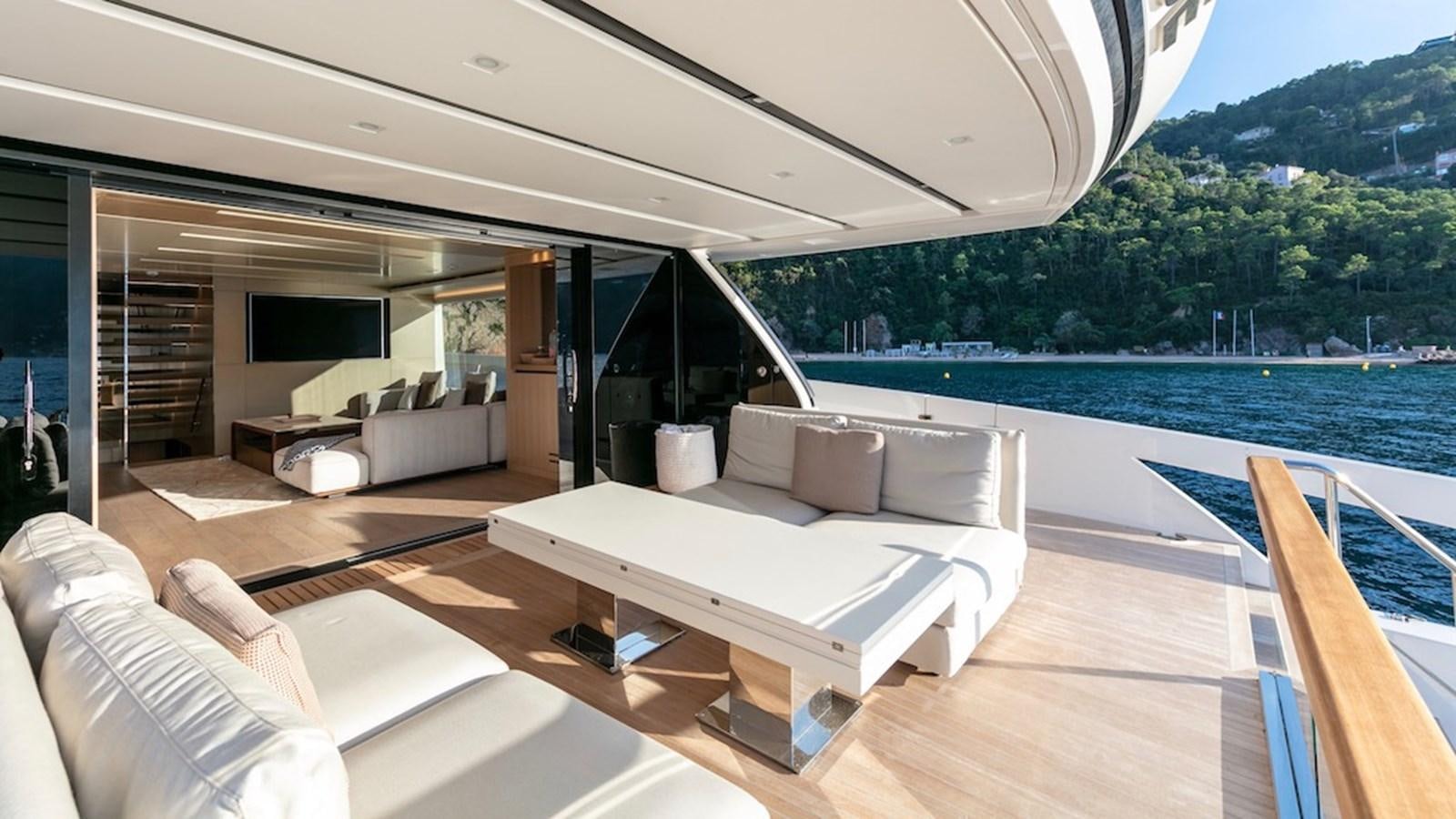 a room with a bed and a couch aboard SANLORENZO SL86/678 Yacht for Sale