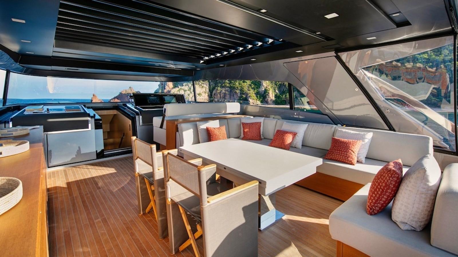 a room with a couch and a table aboard SANLORENZO SL86/678 Yacht for Sale