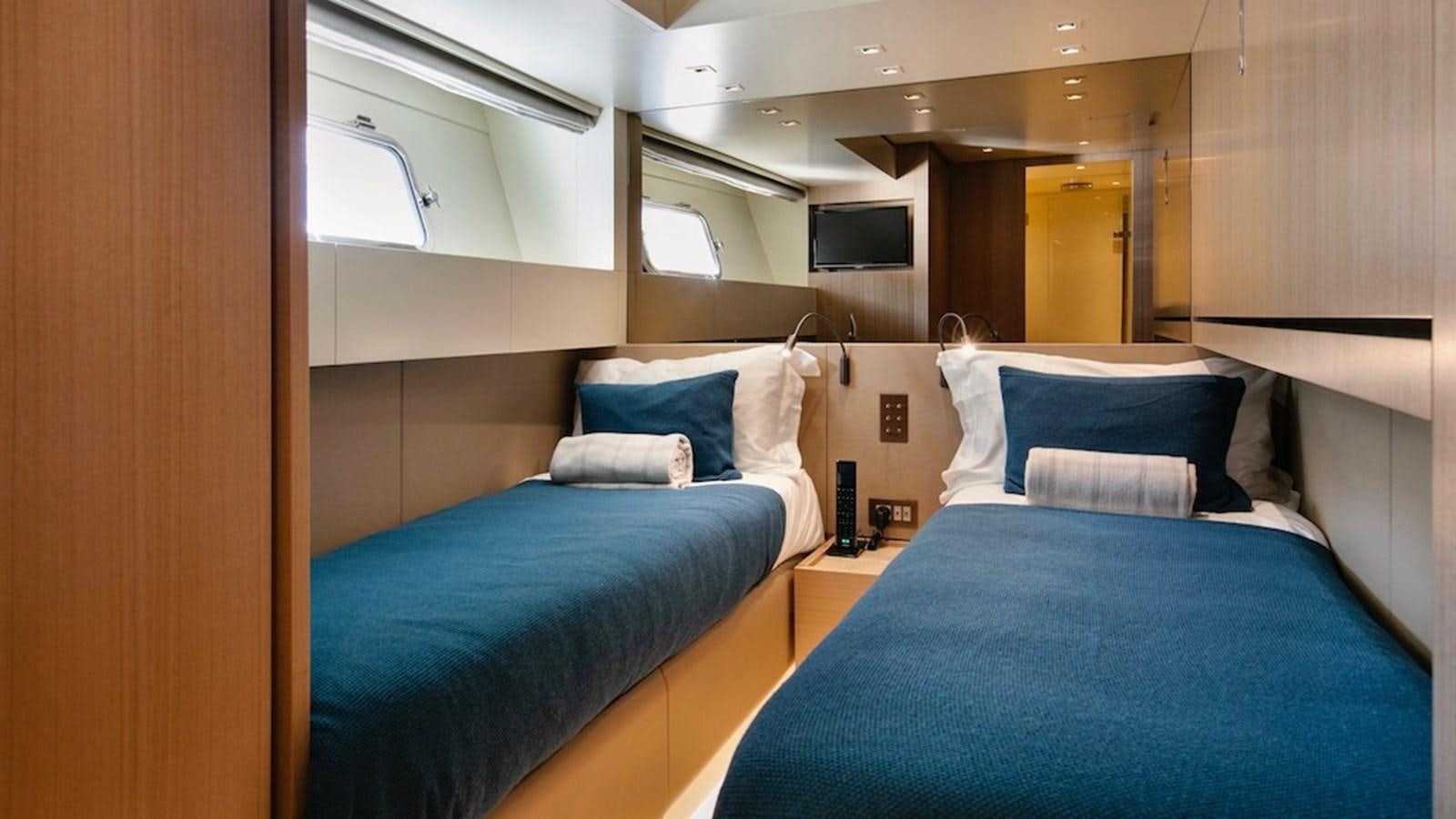 a couple of beds in a room aboard SANLORENZO SL86/678 Yacht for Sale