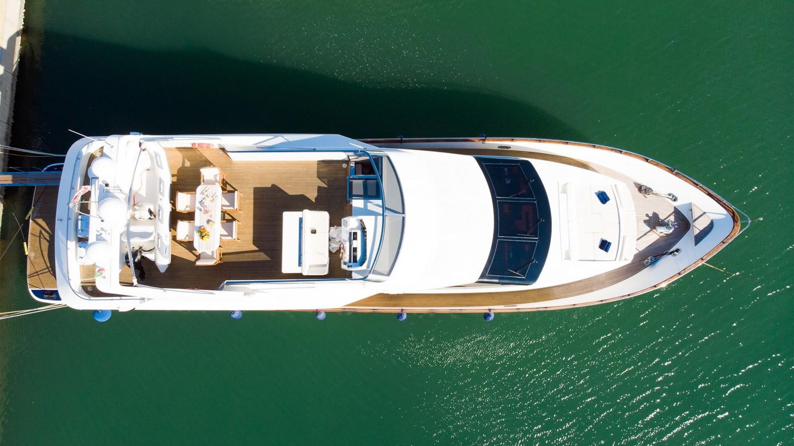 a white and blue boat aboard FIRST LADY II Yacht for Sale