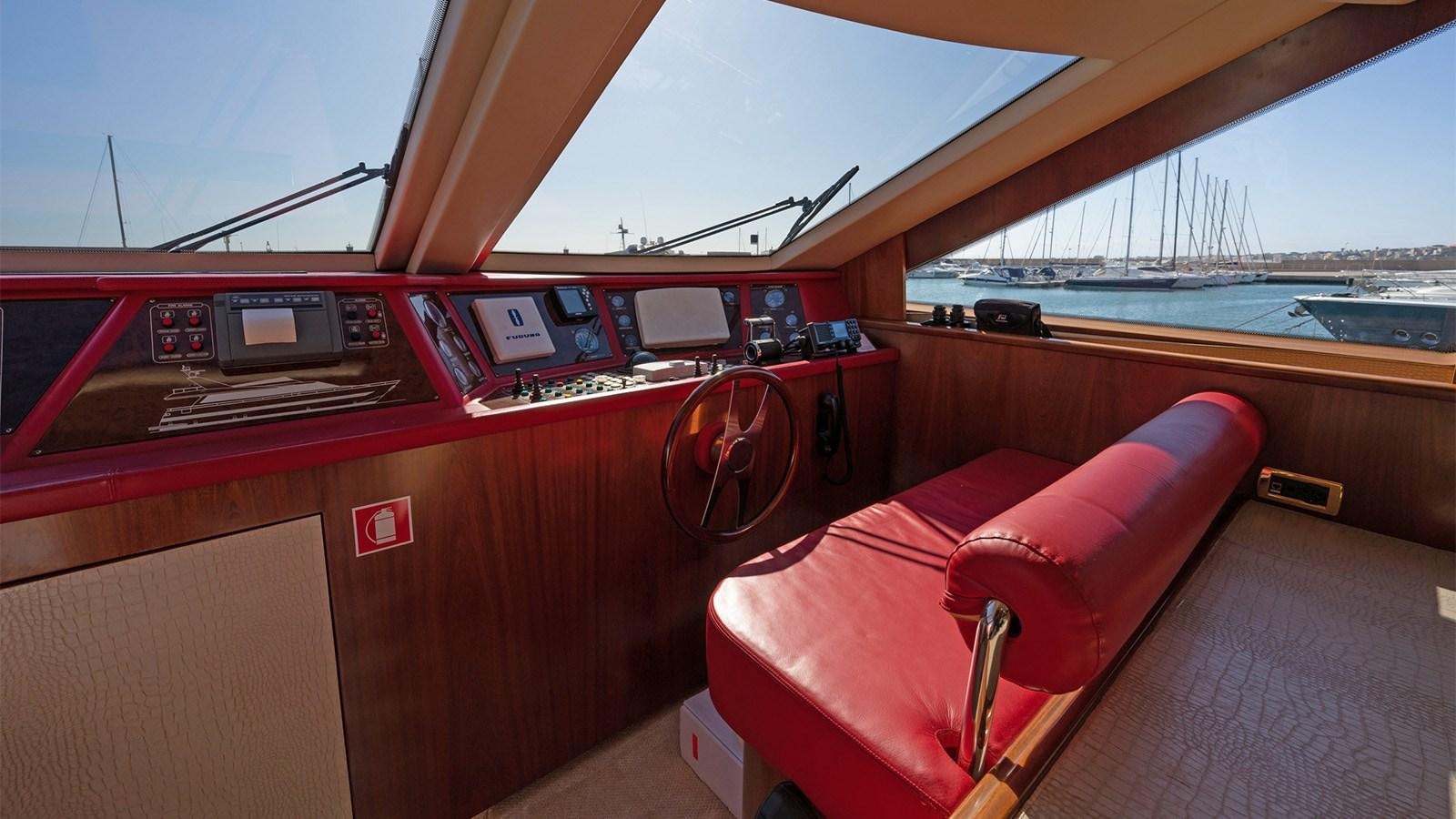 a red car on a road aboard FIRST LADY II Yacht for Sale