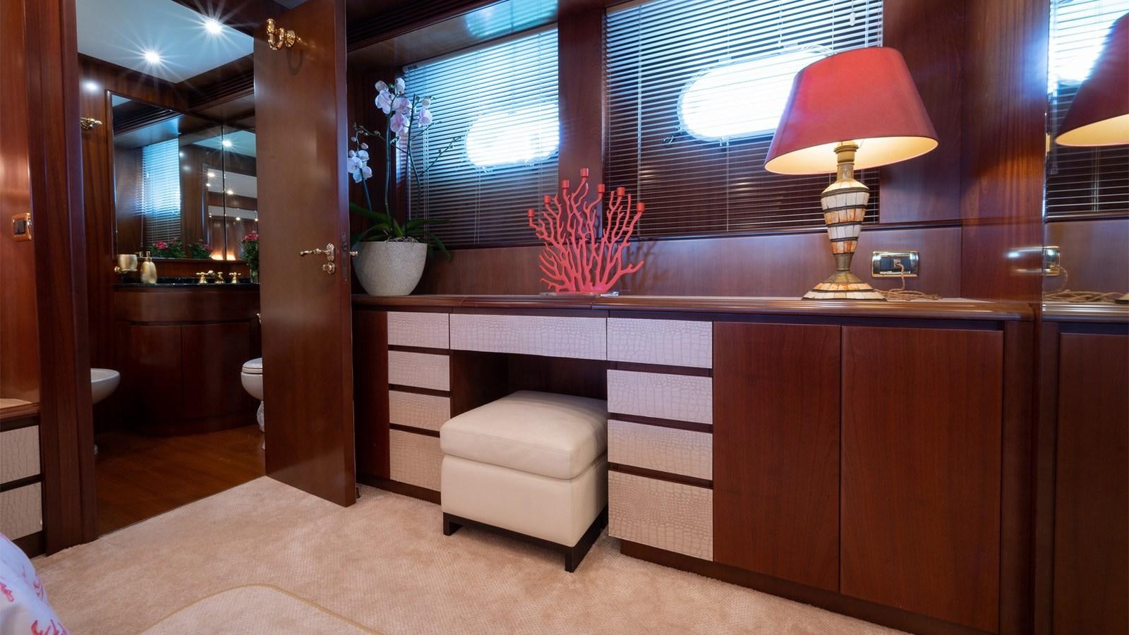 a room with a lamp and a counter aboard FIRST LADY II Yacht for Sale