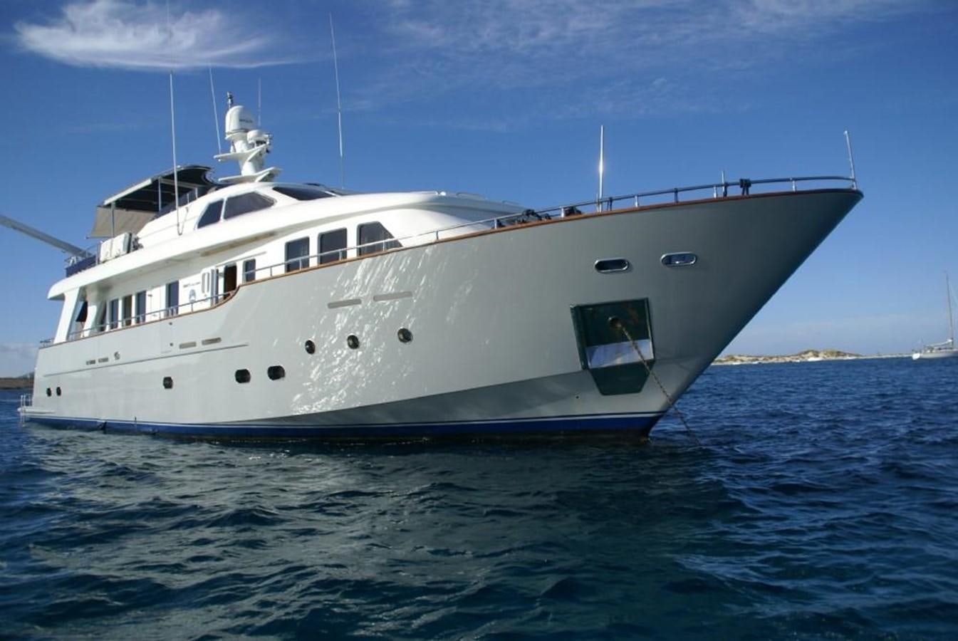 a large white ship in the water aboard AMANZI Yacht for Sale