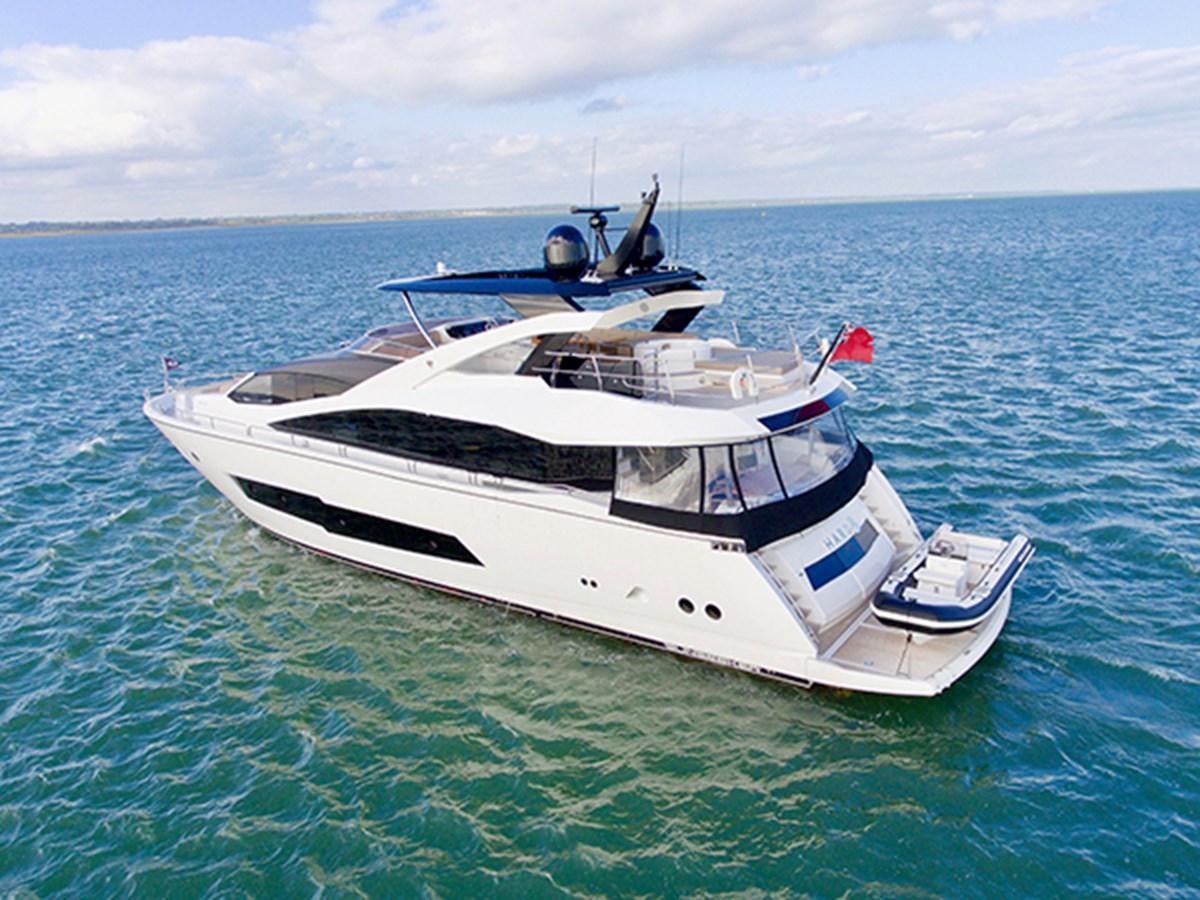 a white boat in the water aboard LADY O Yacht for Sale