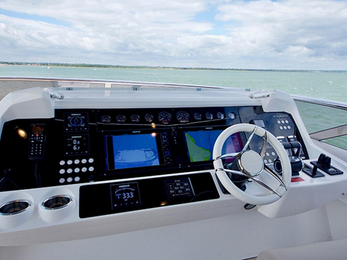 the inside of a car aboard LADY O Yacht for Sale