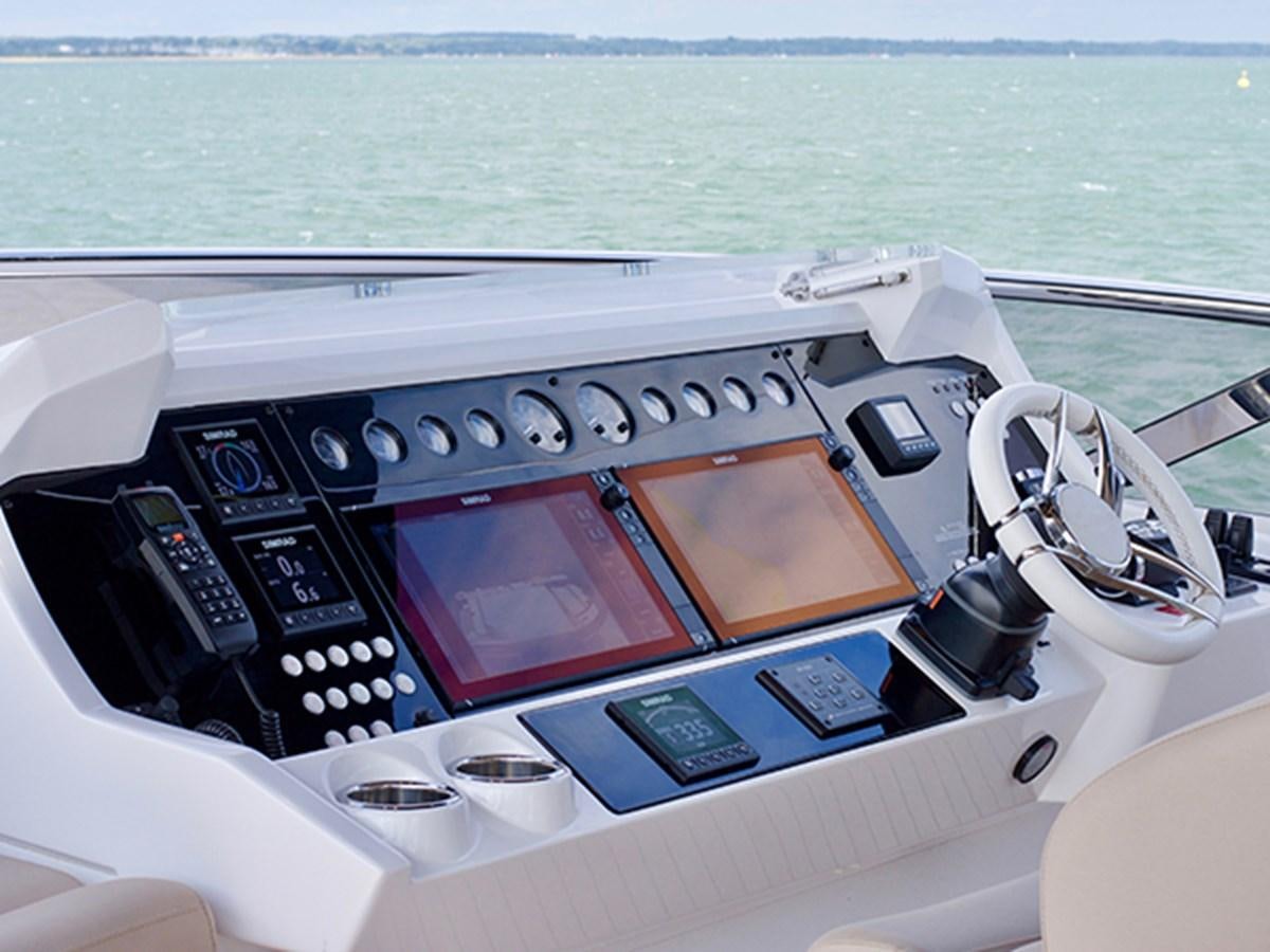 a car driving on a road aboard LADY O Yacht for Sale