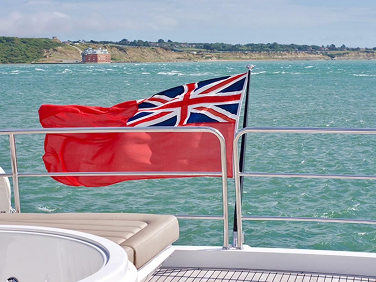 a flag on a boat aboard LADY O Yacht for Sale
