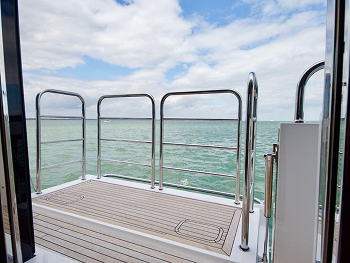 a balcony with railings aboard LADY O Yacht for Sale