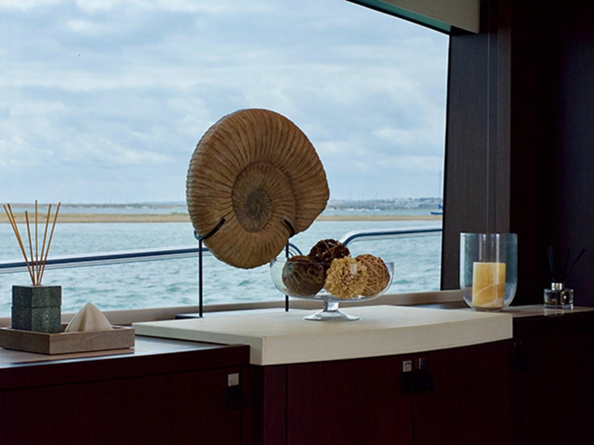 a table with food and a large mushroom on it aboard LADY O Yacht for Sale