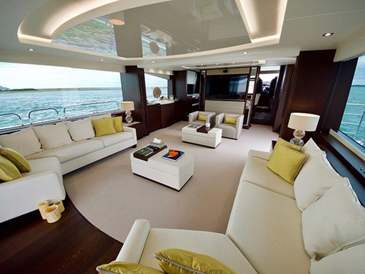 a living room with a large window aboard LADY O Yacht for Sale