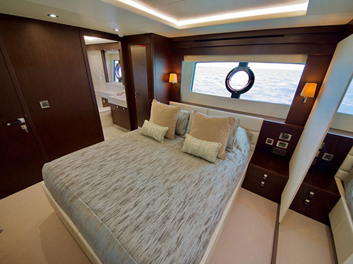 a bed in a room aboard LADY O Yacht for Sale