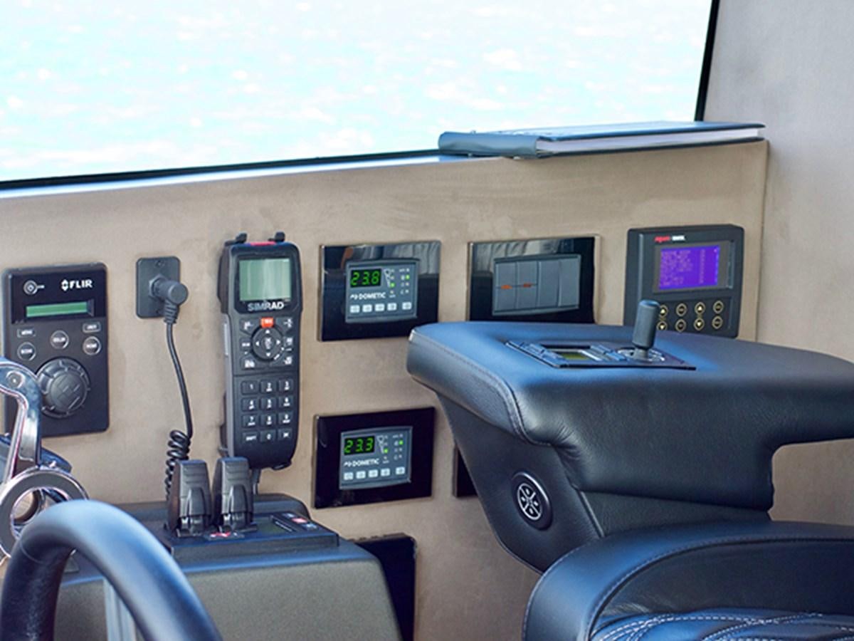 a control panel with a computer aboard LADY O Yacht for Sale