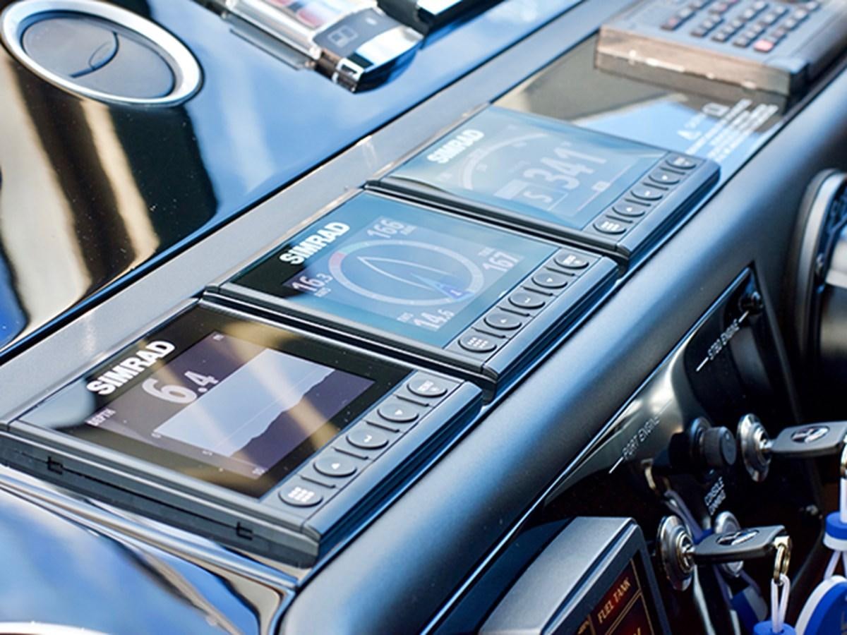 a cell phone in a car aboard LADY O Yacht for Sale