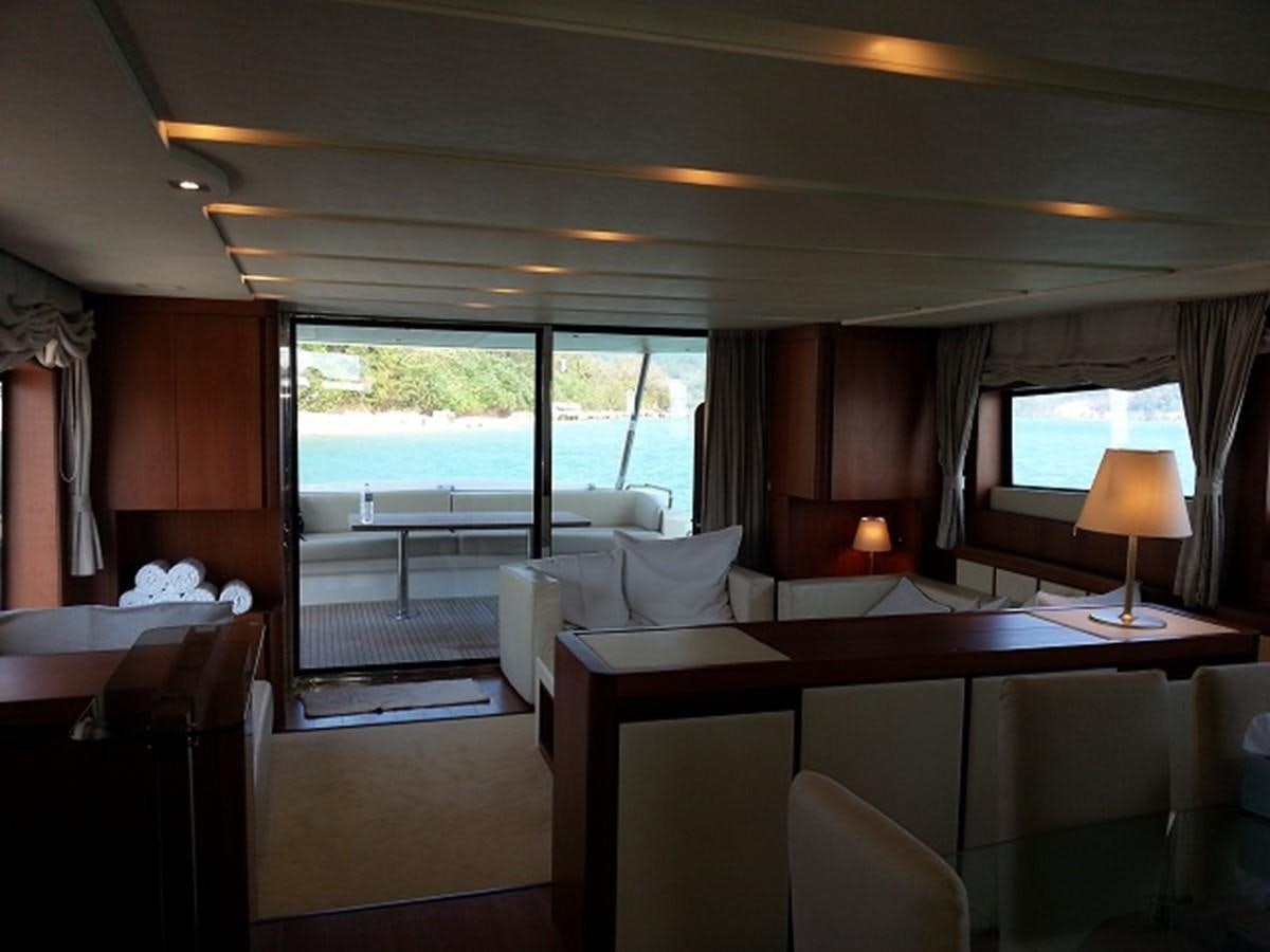 a room with a bed and a desk aboard MY JAYA Yacht for Sale