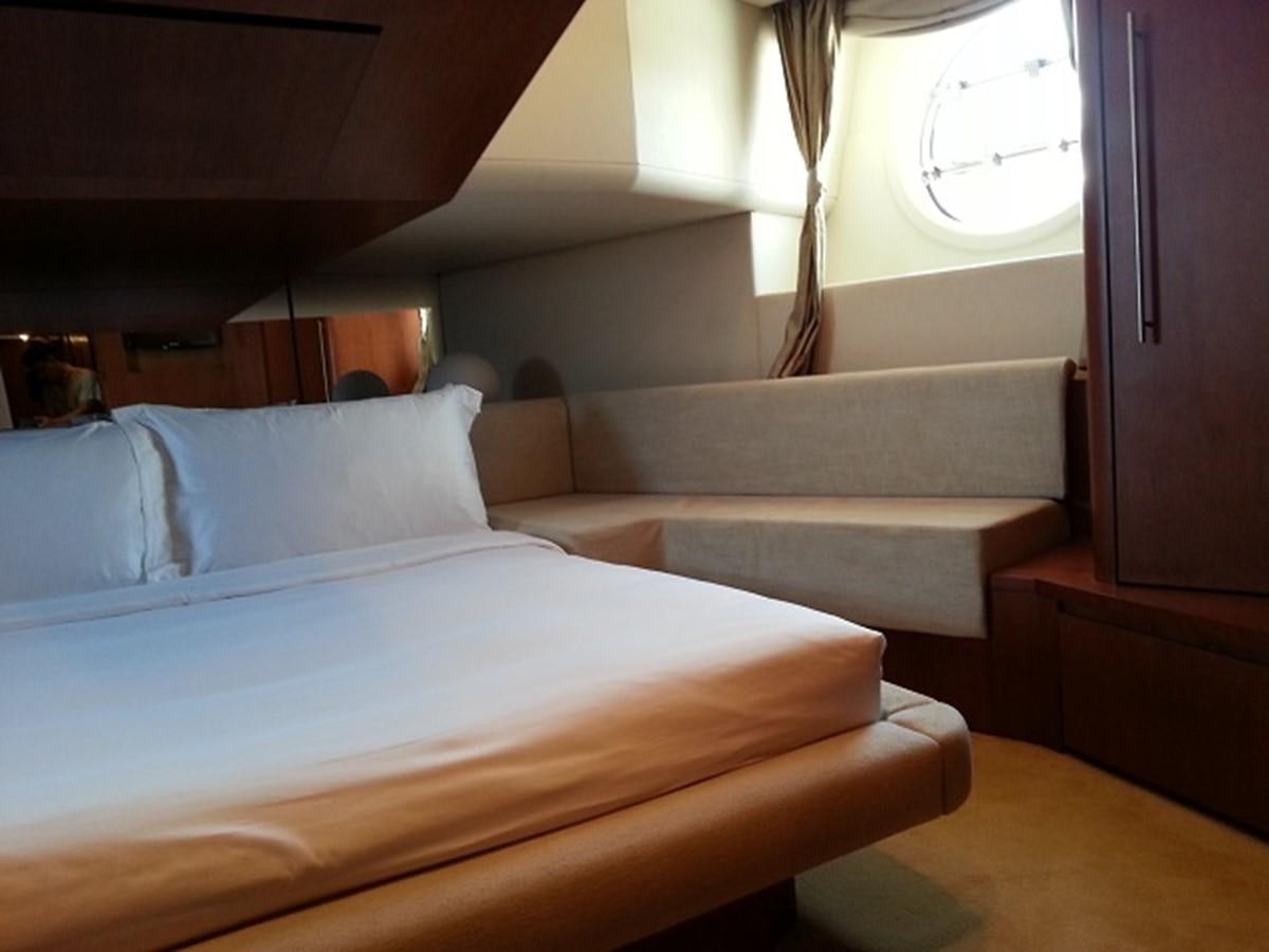 a bed in a room aboard MY JAYA Yacht for Sale