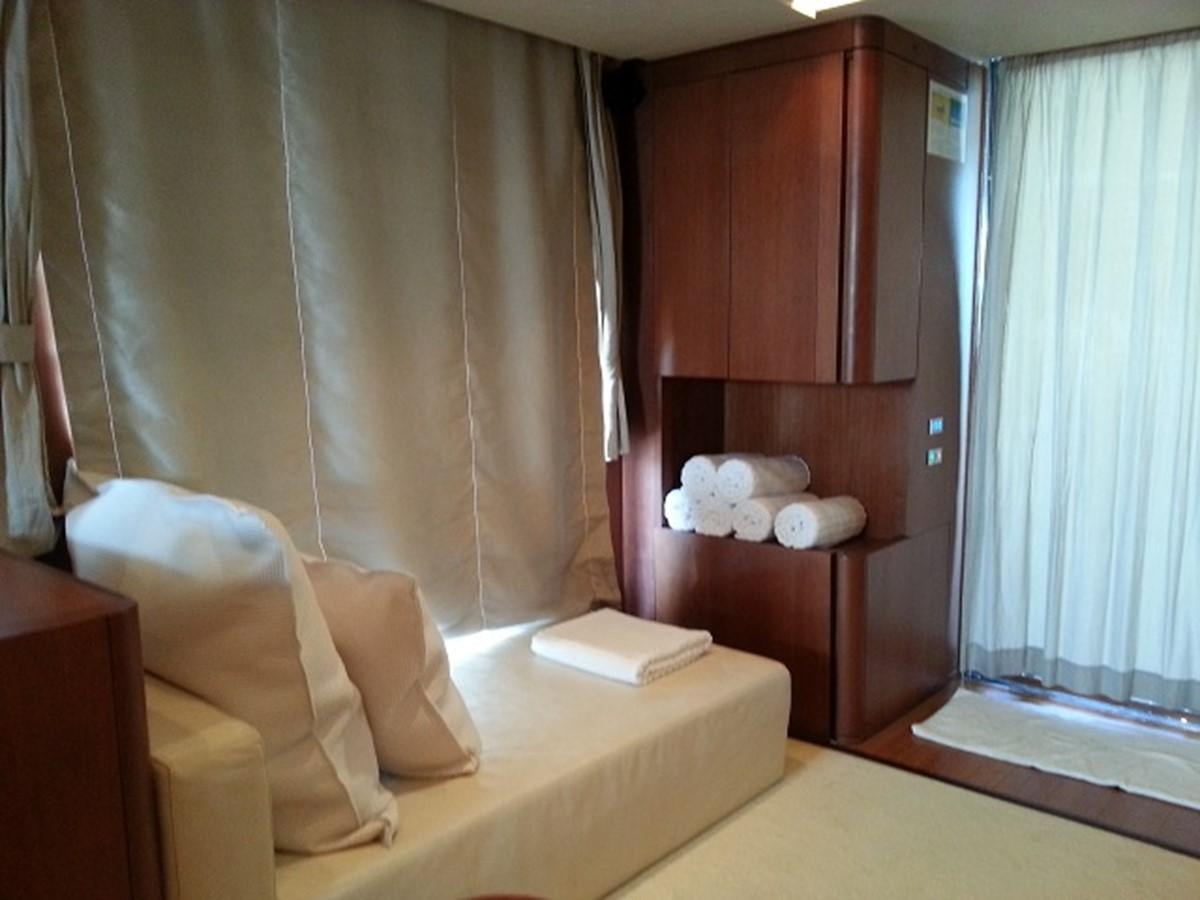 a bed with a white sheet aboard MY JAYA Yacht for Sale