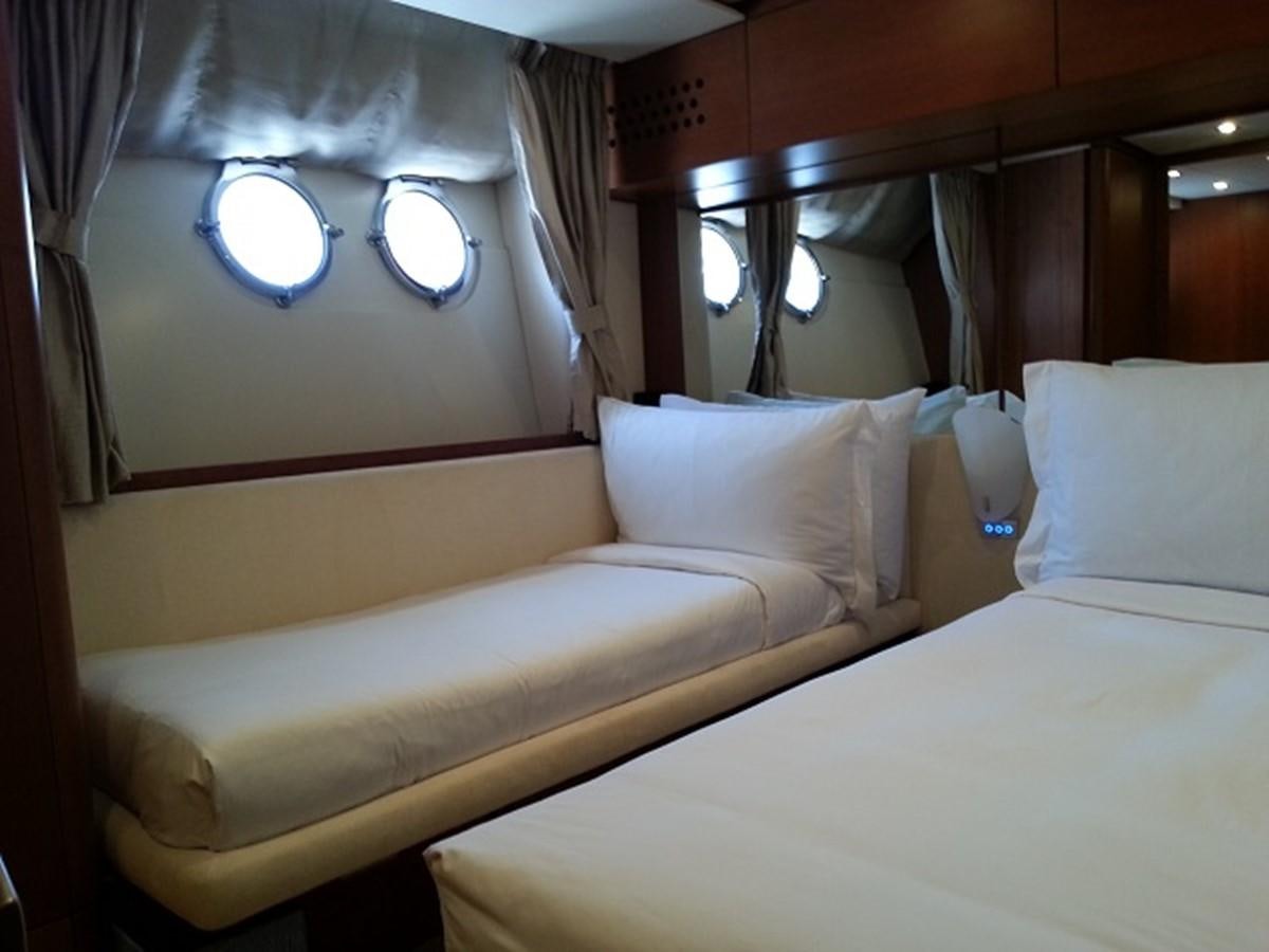 a couple of beds in a hotel room aboard MY JAYA Yacht for Sale