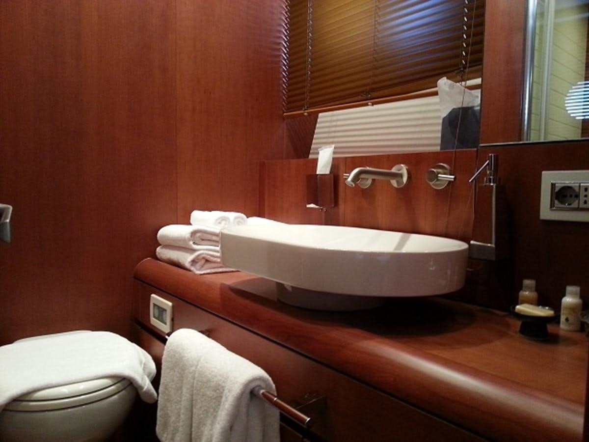 a bathroom with a sink and toilet aboard MY JAYA Yacht for Sale