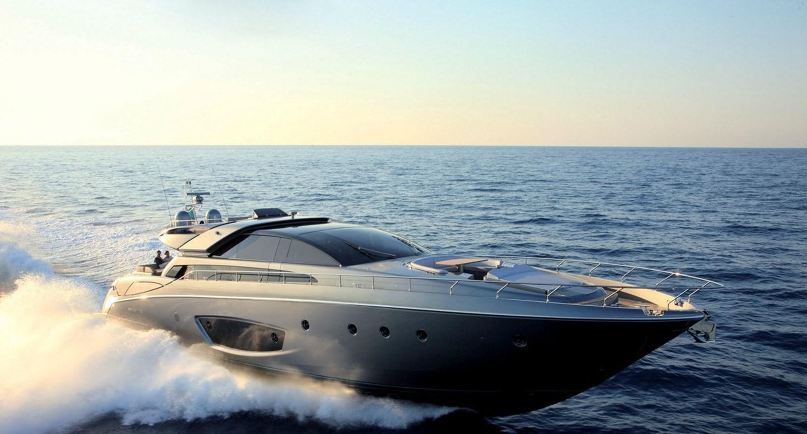 a white yacht in the water aboard RHINO A Yacht for Sale